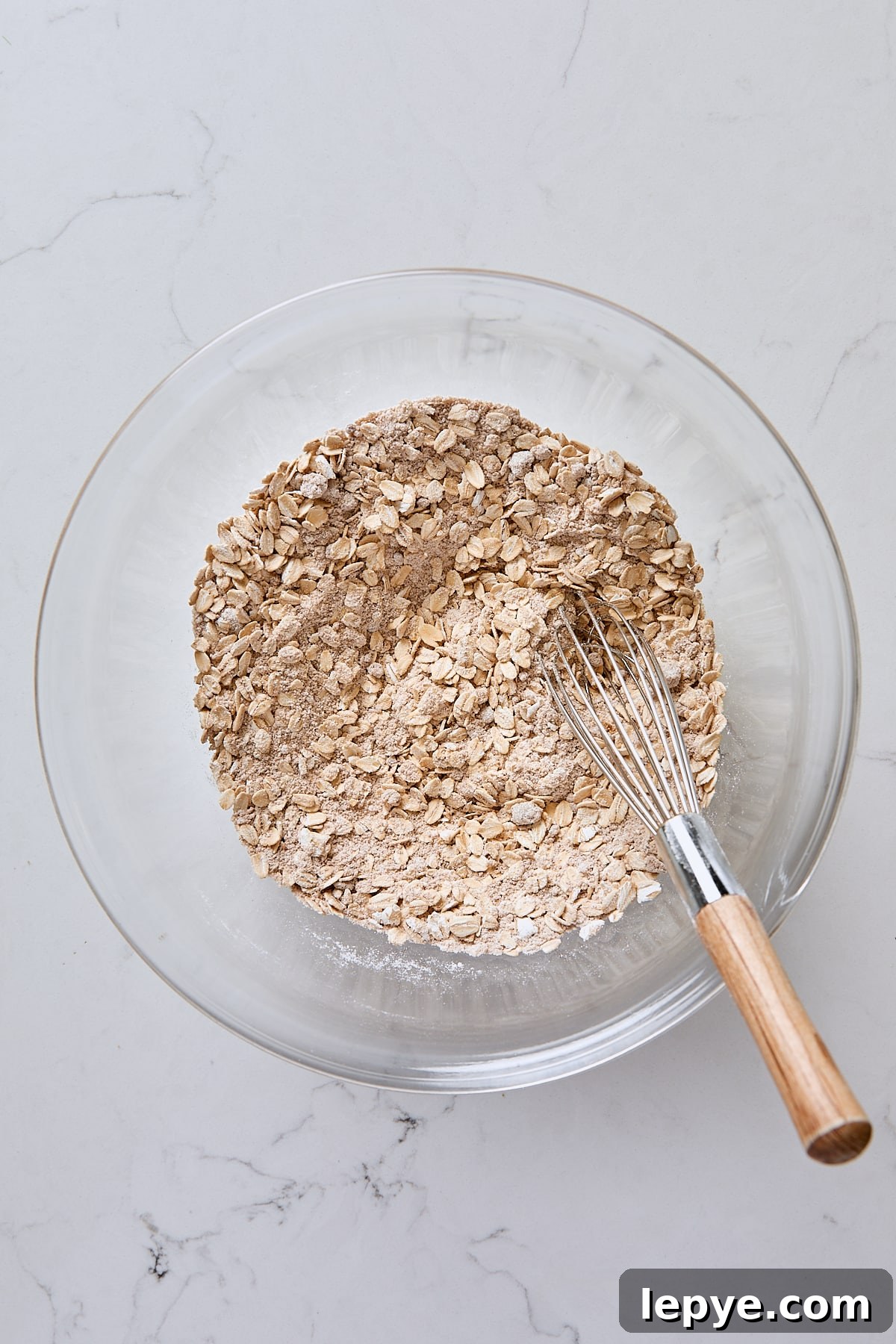 Oat mixture whisked together in glass bowl