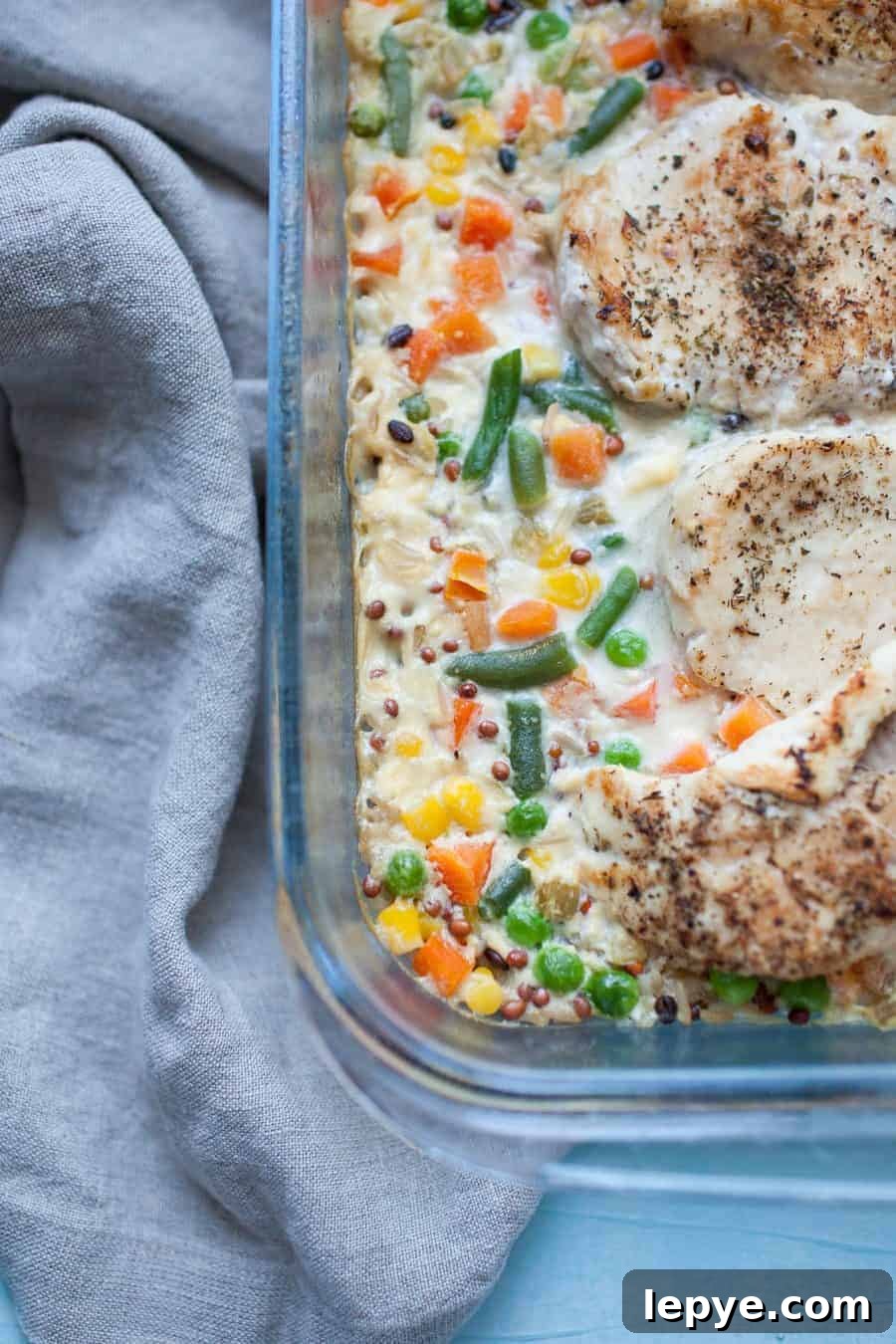 chicken and wild rice casserole in a clear casserole dish