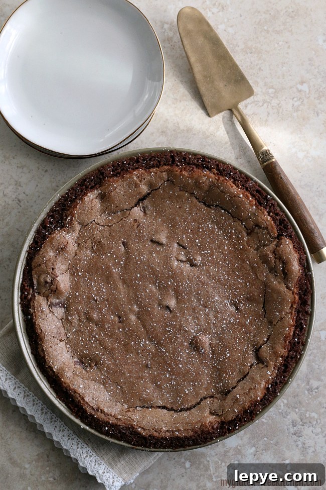 Gluten-Free Double Chocolate Fudge Pie Recipe 6 Gluten-free Fudge Pie with Chocolate Crust and powdered sugar sprinkled