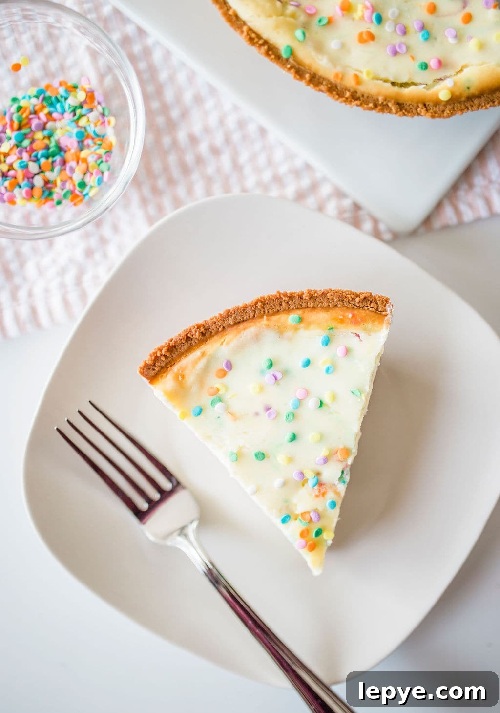 Confetti Birthday Cheesecake Recipe: Moist, Creamy & Festive 2 cheesecake slice