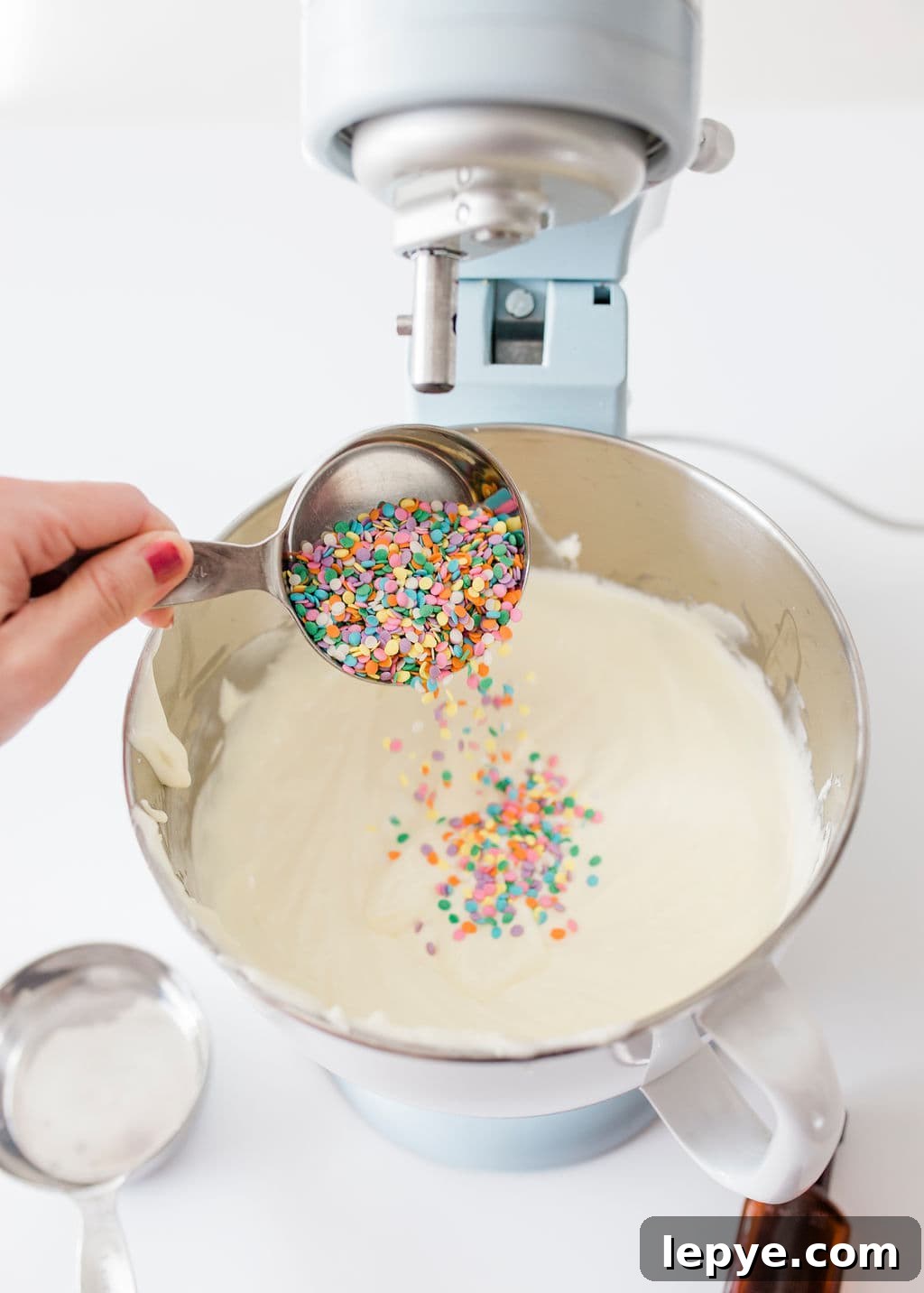 Confetti Birthday Cheesecake Recipe: Moist, Creamy & Festive 7 sprinkles in mixer