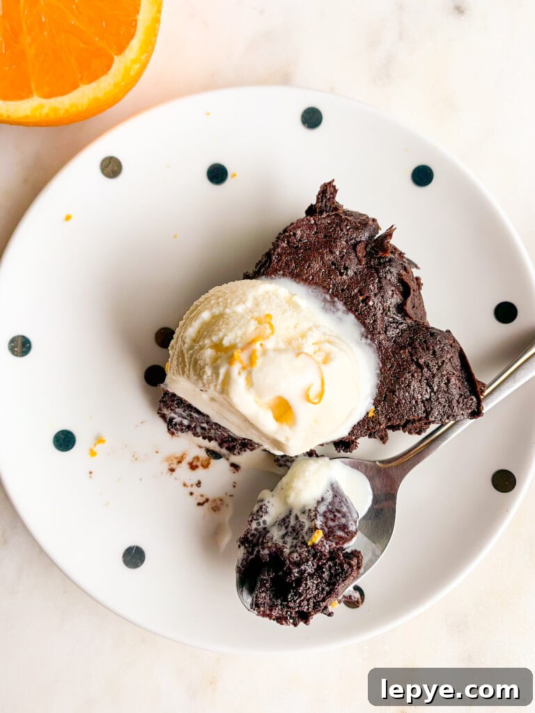 Gooey, fudgy flourless chocolate with fresh orange zest!