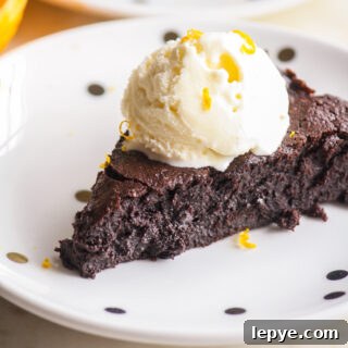 Gooey, fudgy flourless chocolate with fresh orange zest!