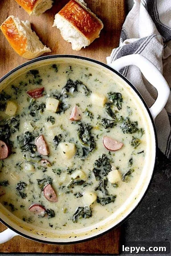 Creamy Kielbasa, Potato & Kale Soup Recipe 8 Creamy Potato Kielbasa and Kale Soup white enamel Dutch oven.