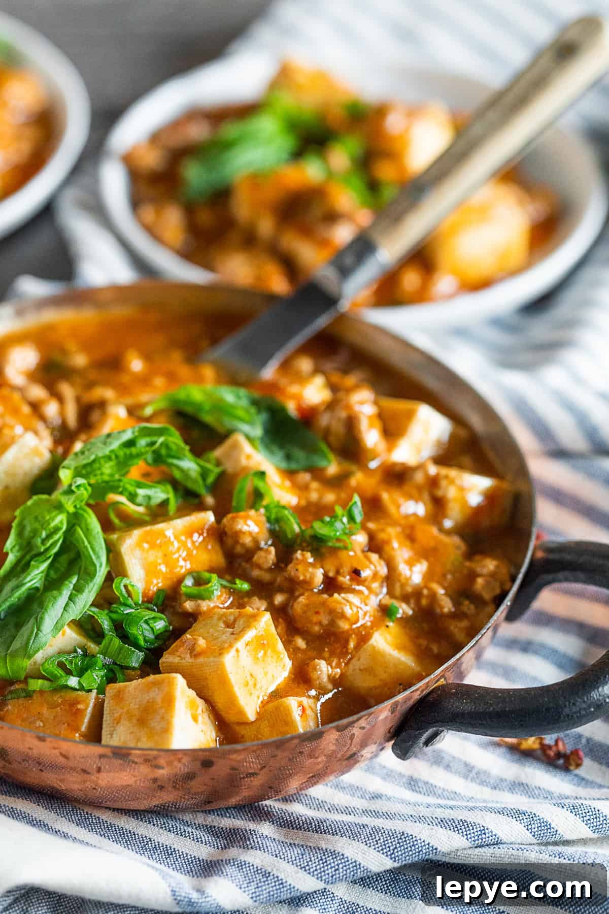 Ground Pork Mapo Tofu in a small copper serving bowl.