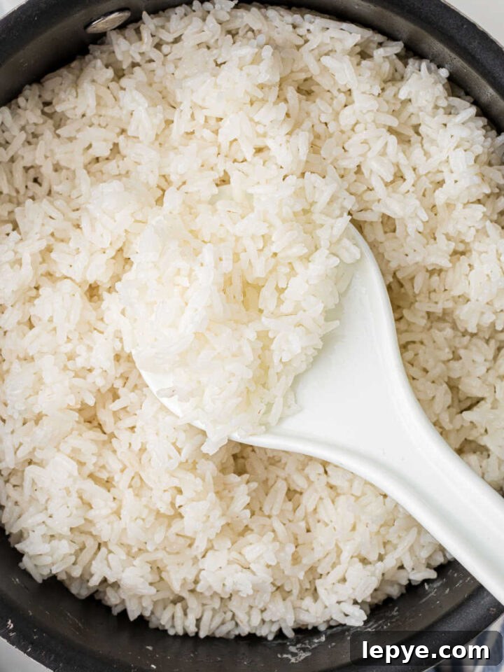Overhead shot of a pan of fluffy white rice.