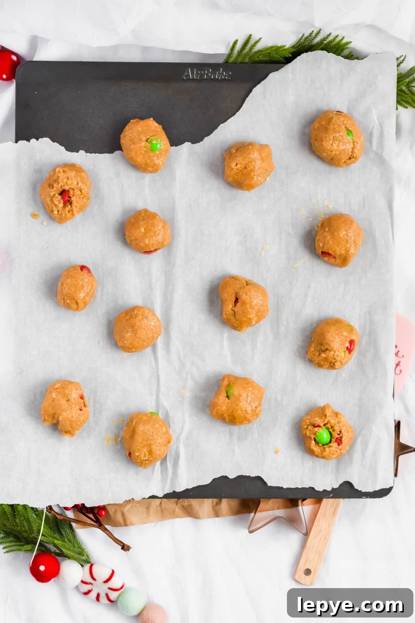 Chewy Oatmeal Monster Cookies with Chocolate and Peanut Butter 5 roll into cookie dough balls and place on a baking sheet