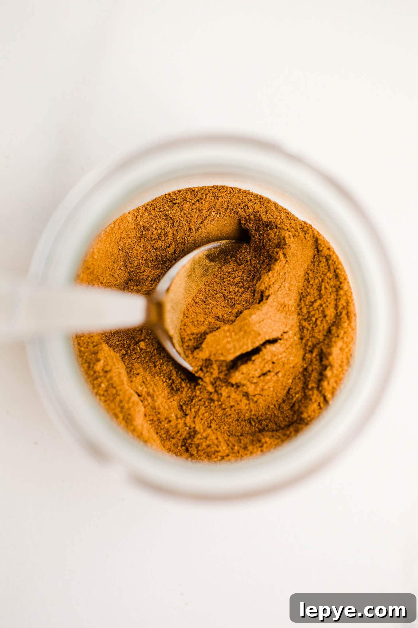 Homemade Pumpkin Pie Spice Blend for Baking and Drinks 2 Spices in a glass jar.