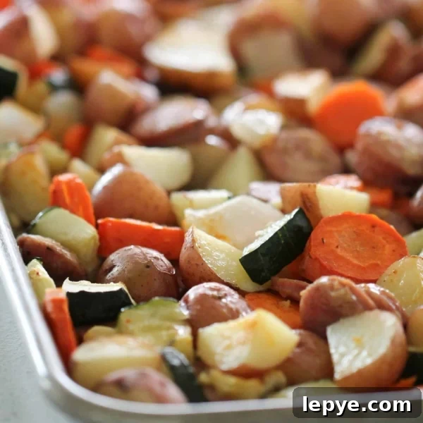 Freezer Meal Planning for Large and Small Families 3 Sheet Pan Chicken Sausage and Vegetables