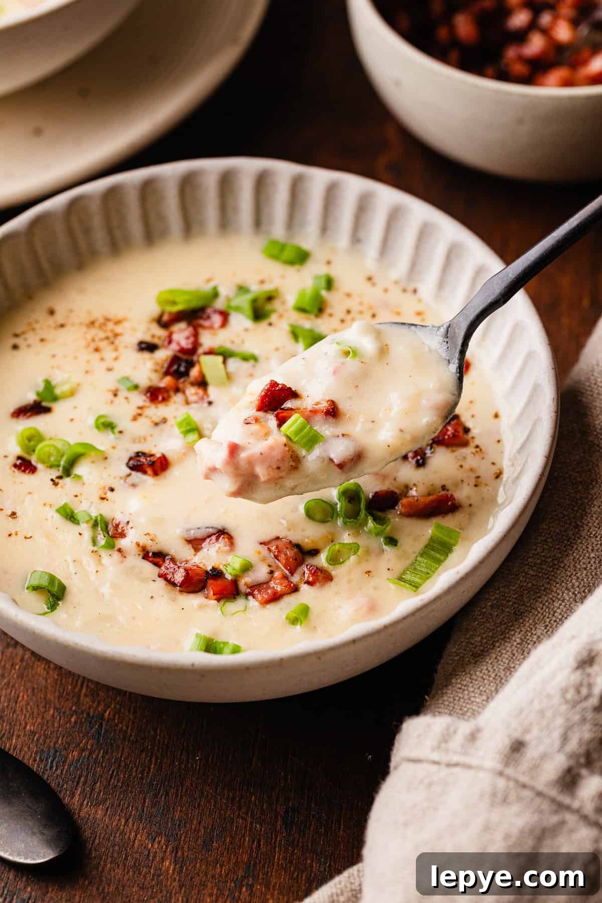 Crockpot Potato Soup with Evaporated Milk — Creamy Dinner Recipe 11 The completed potato soup with ham.