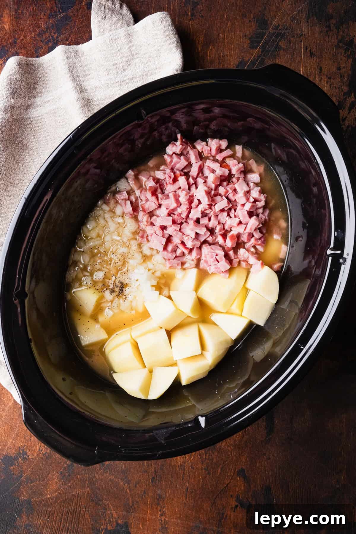 Crockpot Potato Soup with Evaporated Milk — Creamy Dinner Recipe 4 Recipe ingredients in the crockpot.