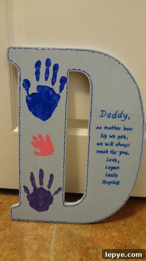 Unique Father's Day Gift and Activity Ideas for 2026 2 DIY Father's Day idea - wooden letter D painted and decorated with handprints
