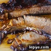 Instant Pot Beef Brisket on wood cutting board