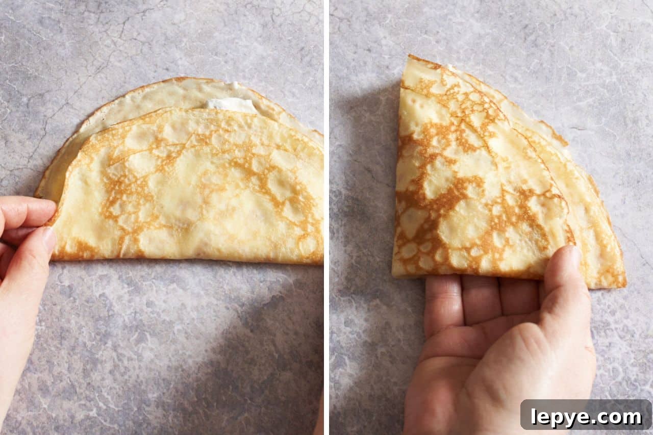 Sweet Nalysnyky: Classic Ukrainian Crepes with Cottage Cheese Filling 9 Two photos side by side showing a filled crepe being folded, on the left, it has been folded in half, on the right, a woman's hands have folded in in half a second time, making a wedge shape.