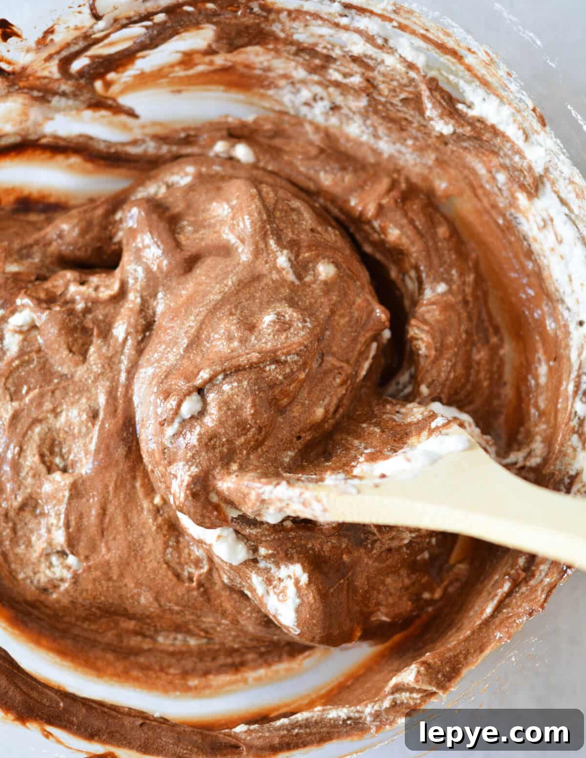 Decadent Chocolate Mousse Recipe for Silky, No-Bake Perfection 16 stirring chocolate mousse.