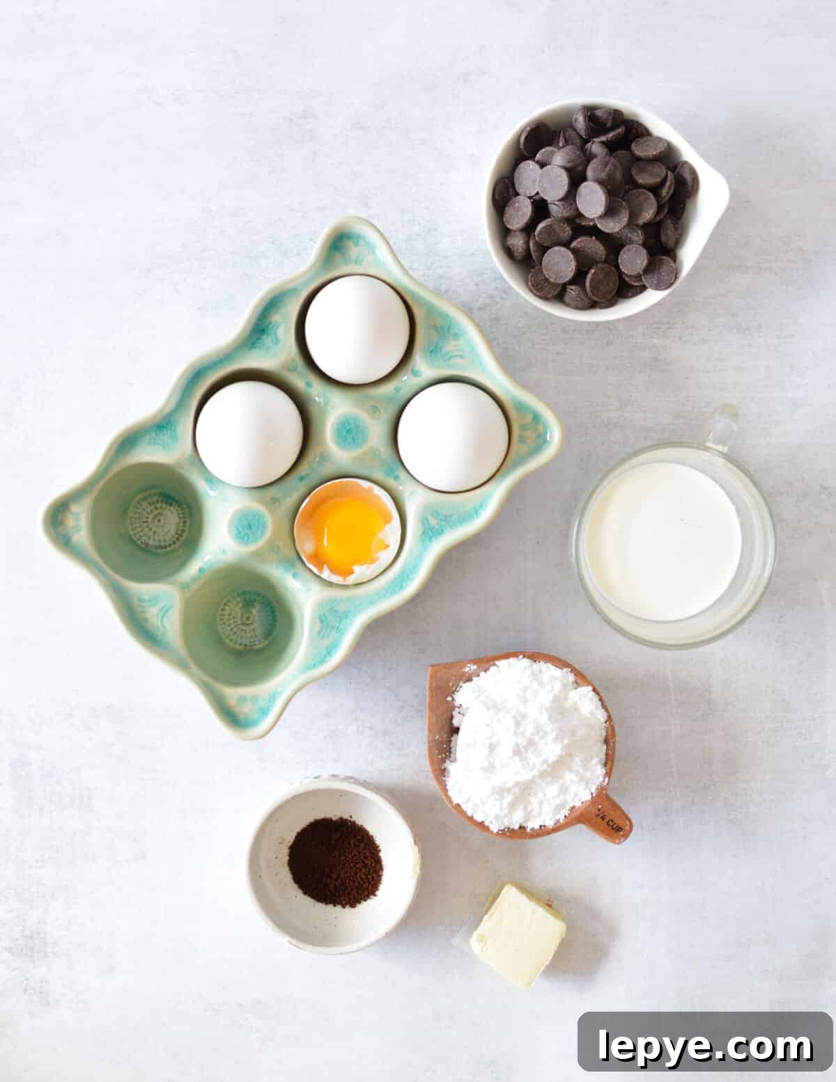 Decadent Chocolate Mousse Recipe for Silky, No-Bake Perfection 4 eggs, heavy cream, powdered sugar, instant coffee, butter.