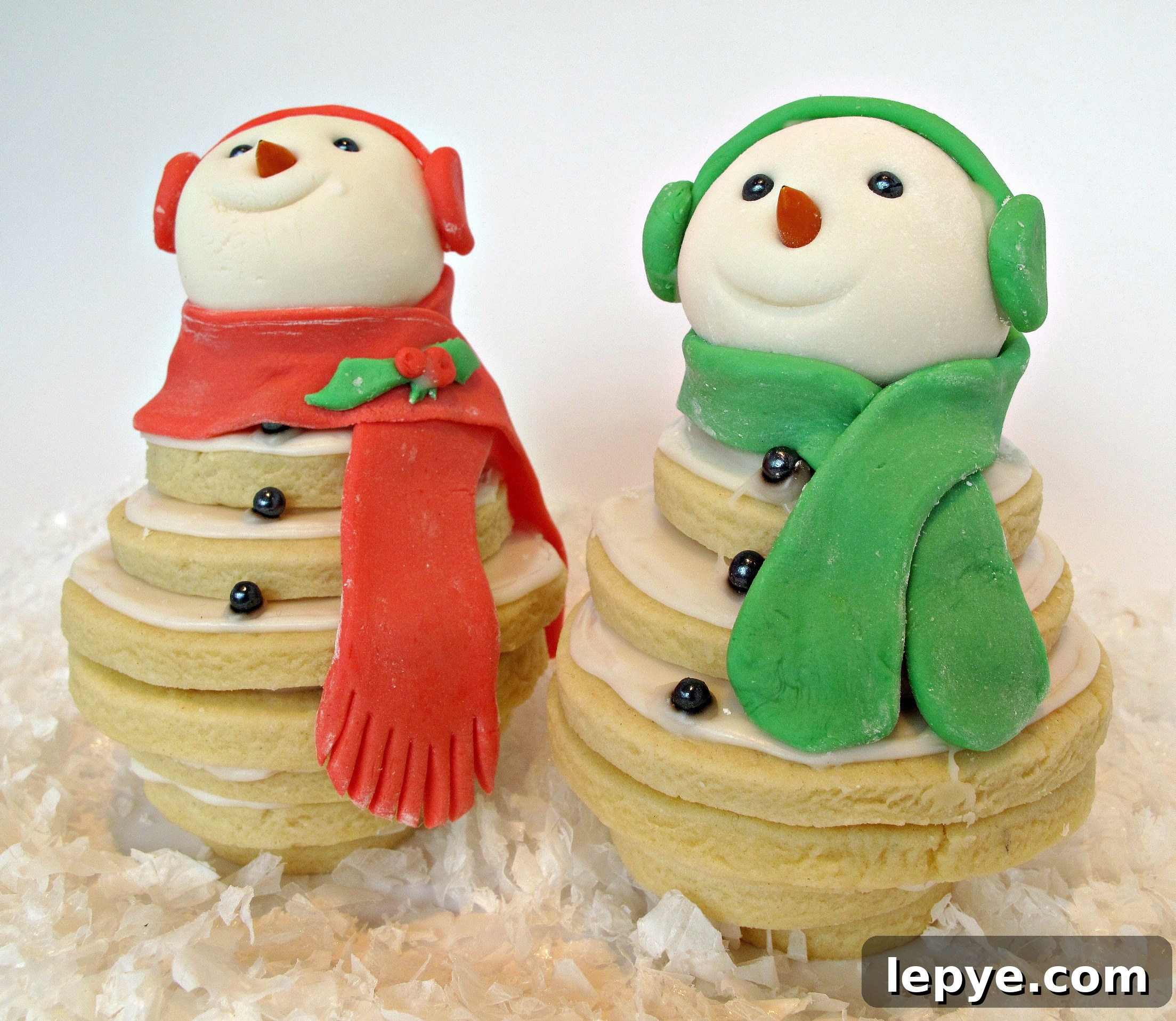 Closeup of stacked decorated cookies.