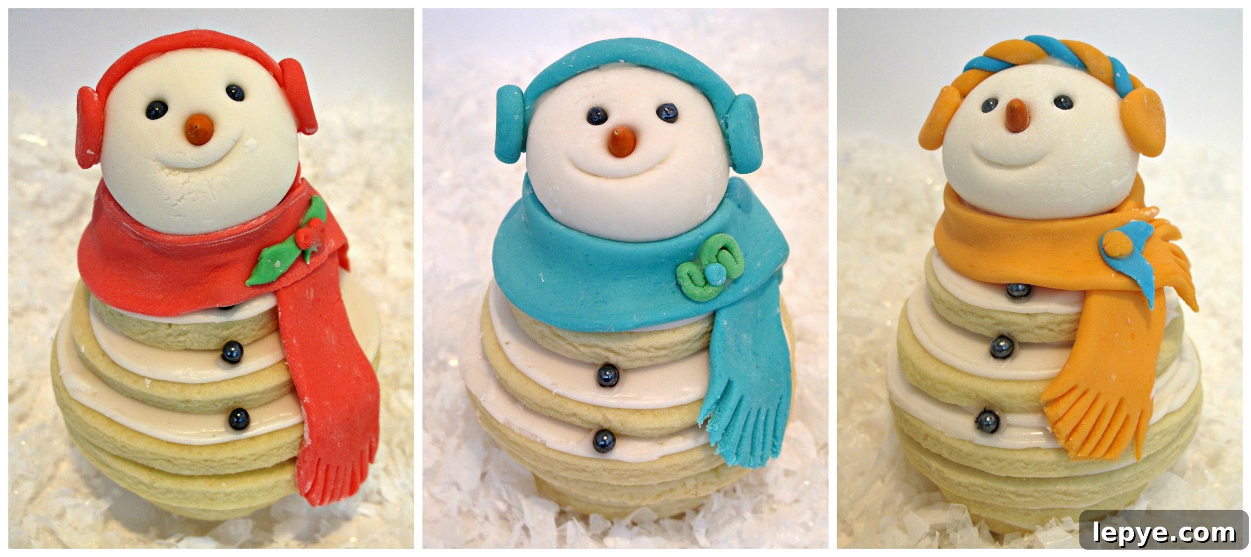 Three cookie snowment with different colors of decorations.