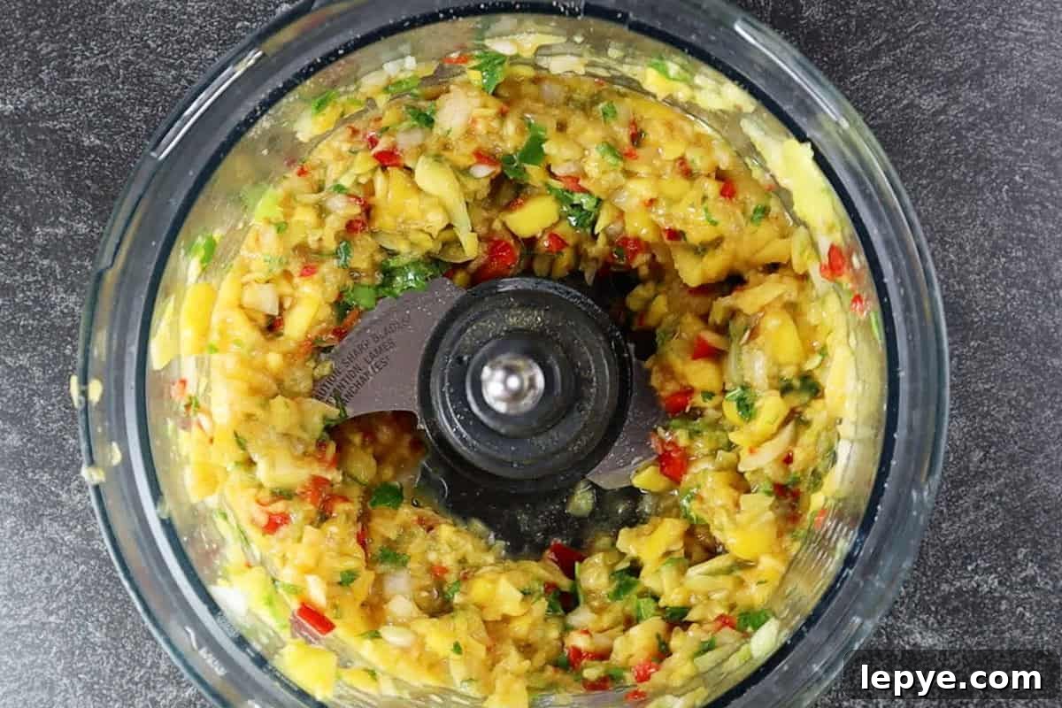 Grilled Salmon with Fresh Mango Salsa Recipe 10 mango salsa blended in food processor bowl.
