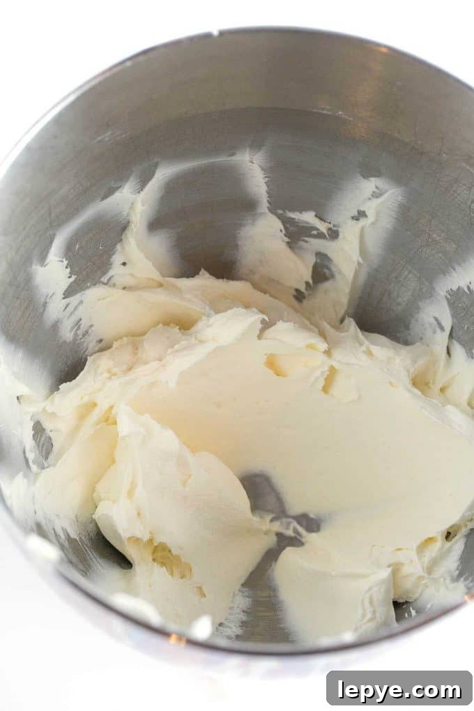 Cream Cheese Frosting Recipe for Cookies: Smooth & Spreadable 5 Bowl of butter after being beaten