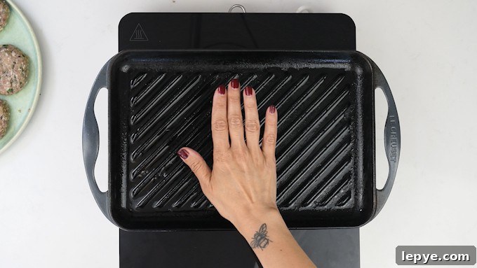 Authentic Lamb Kofta Recipe: Juicy Middle Eastern Meatballs 8 Testing griddle pan is hot