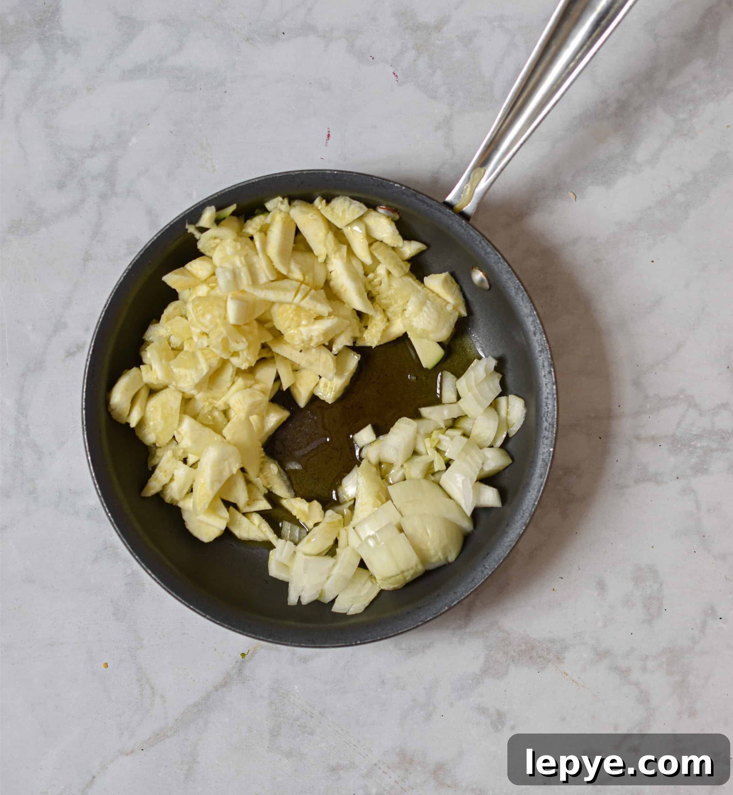 Saute the zucchini meat and onions in olive oil