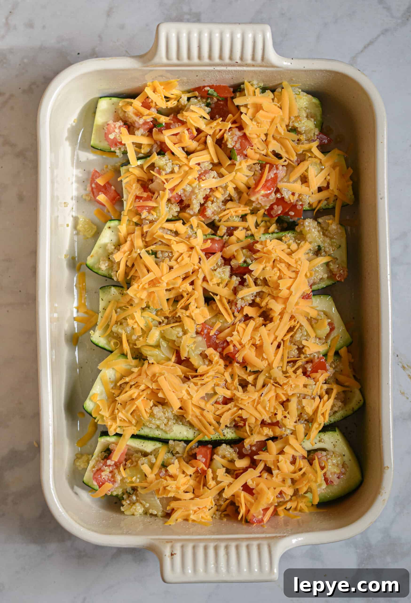 top with shredded cheese