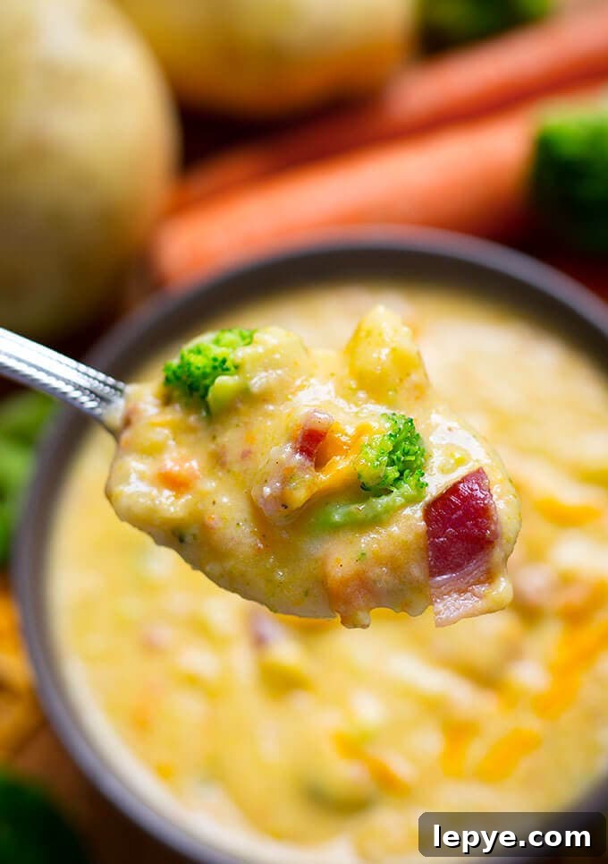 Loaded Broccoli, Cheese & Potato Soup Recipe 3 Closeup of spoonful of Loaded Broccoli Cheese & Potato Soup