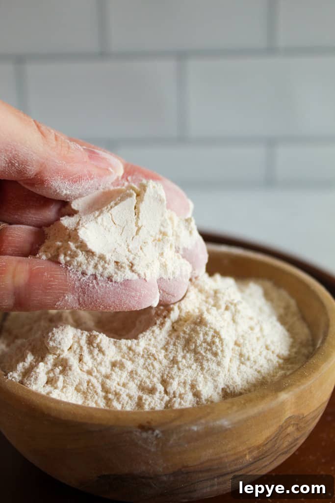 hand holding cassava flour.