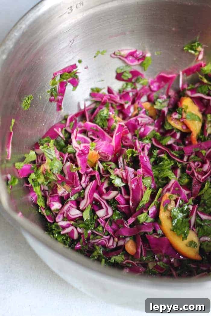 Zesty Tofu Tacos with Peach and Cabbage Slaw 5 Change the tofu game with these delicious Zesty Sheet Pan Tofu Tacos with Peach Kale Slaw! A fresh, flavorful, wholesome meal the entire family will devour. Vegan + gluten-free.