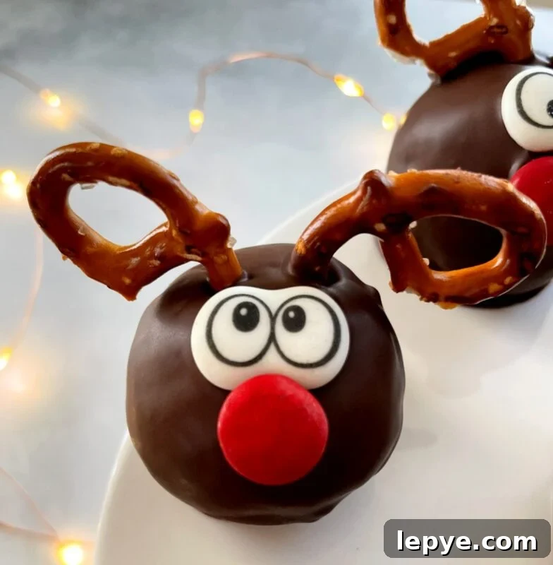 reindeer cake bite with pretzel antlers.