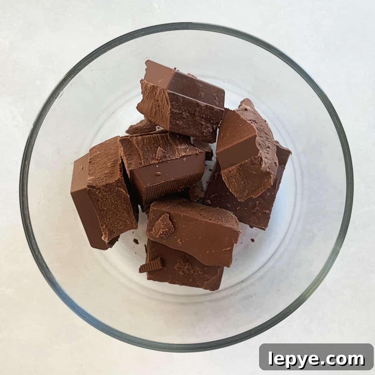 chocolate almond bark pieces in a bowl.