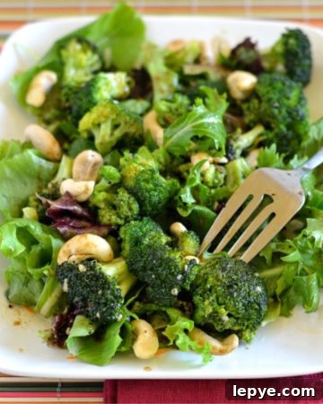 Roasted Broccoli Salad served on a white salad plate.