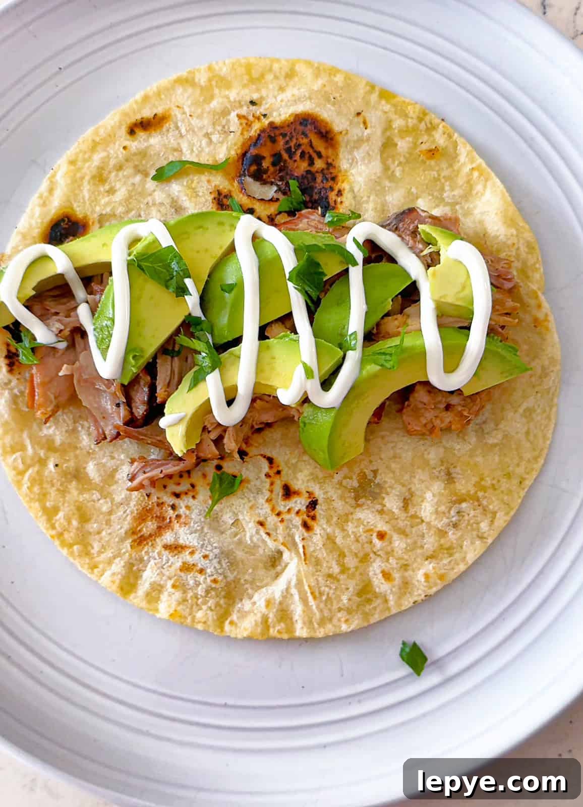 Pineapple Pulled Pork Tacos Made in a Slow Cooker 3 Slow Cooked Pineapple Pork Tacos with avocado