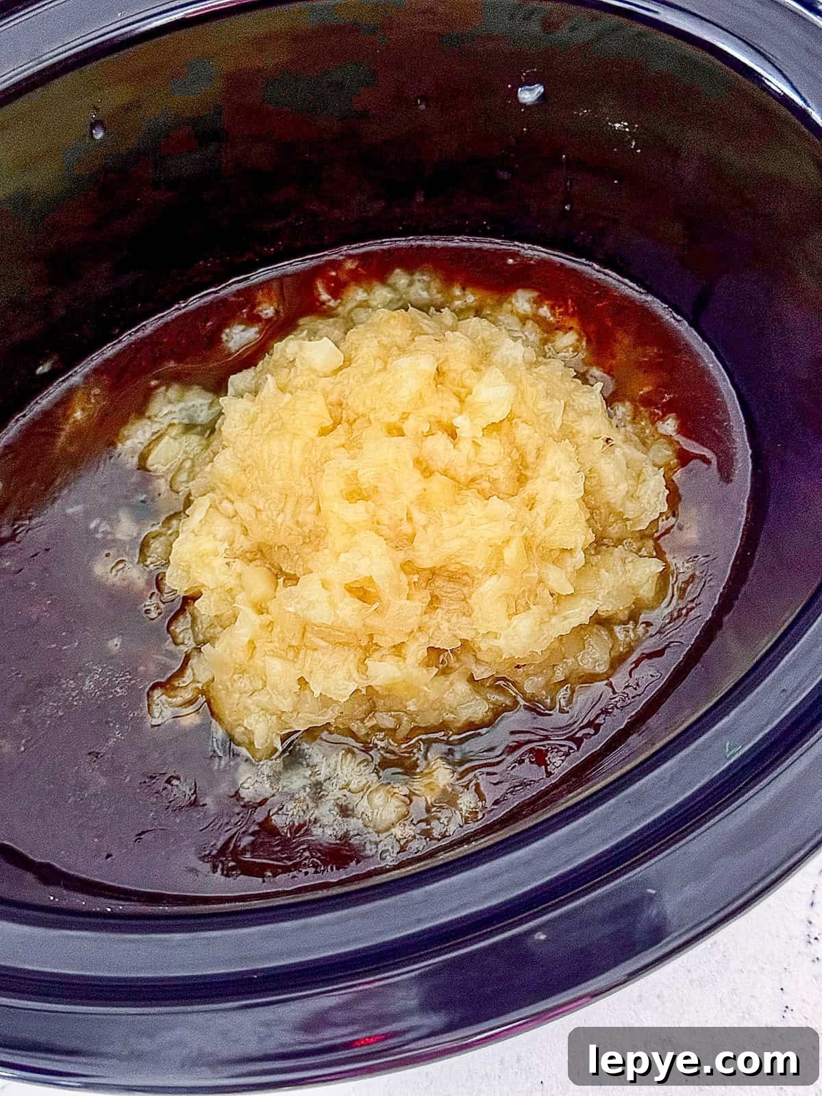 Pineapple Pulled Pork Tacos Made in a Slow Cooker 5 Pineapple and BBQ sauce in a crock pot