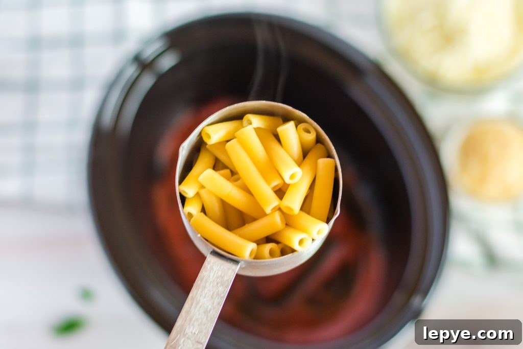 Is there anything more comforting than a delicious, warm Baked Ziti with Ricotta? This Slow Cooker Baked Ziti recipe is made using a crockpot so it’s ready when you are, and best of all it’s super easy! This version is Vegetarian, but if you’re not into meatless you can always add to it!