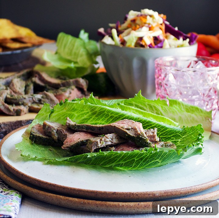 Steak Salad Wraps with Tangy Chimichurri and Crisp Veggies 3 Strips of flank steak in lettuce wraps