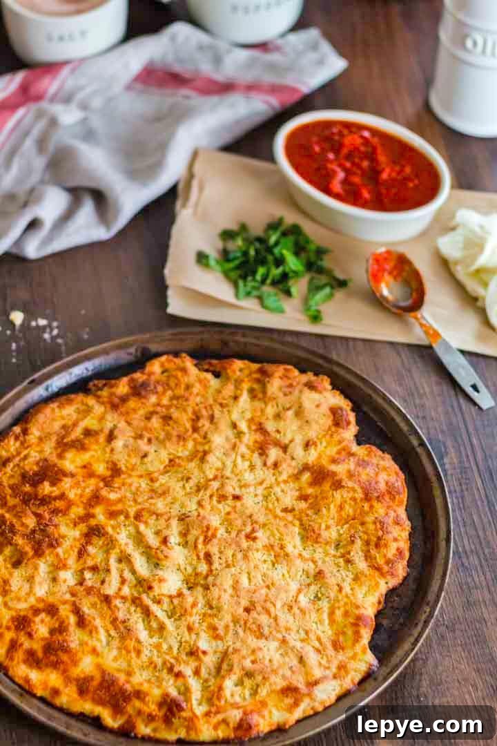 A keto pizza crust on top of a table