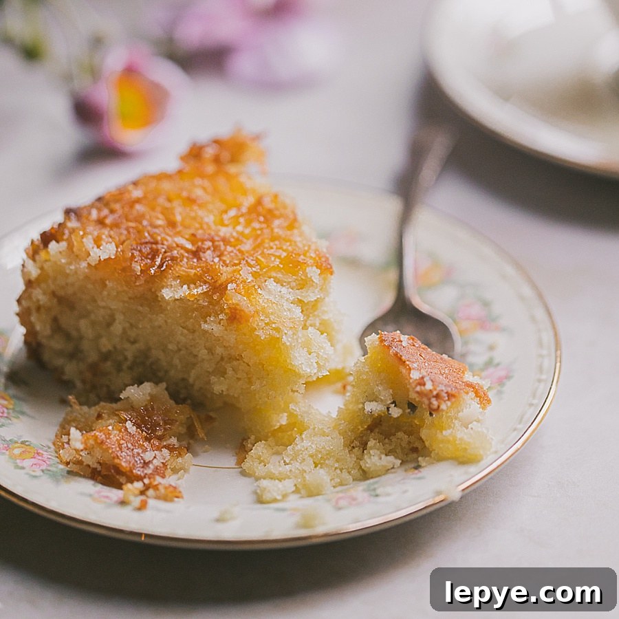 slice of tender moist pineapple coconut cake