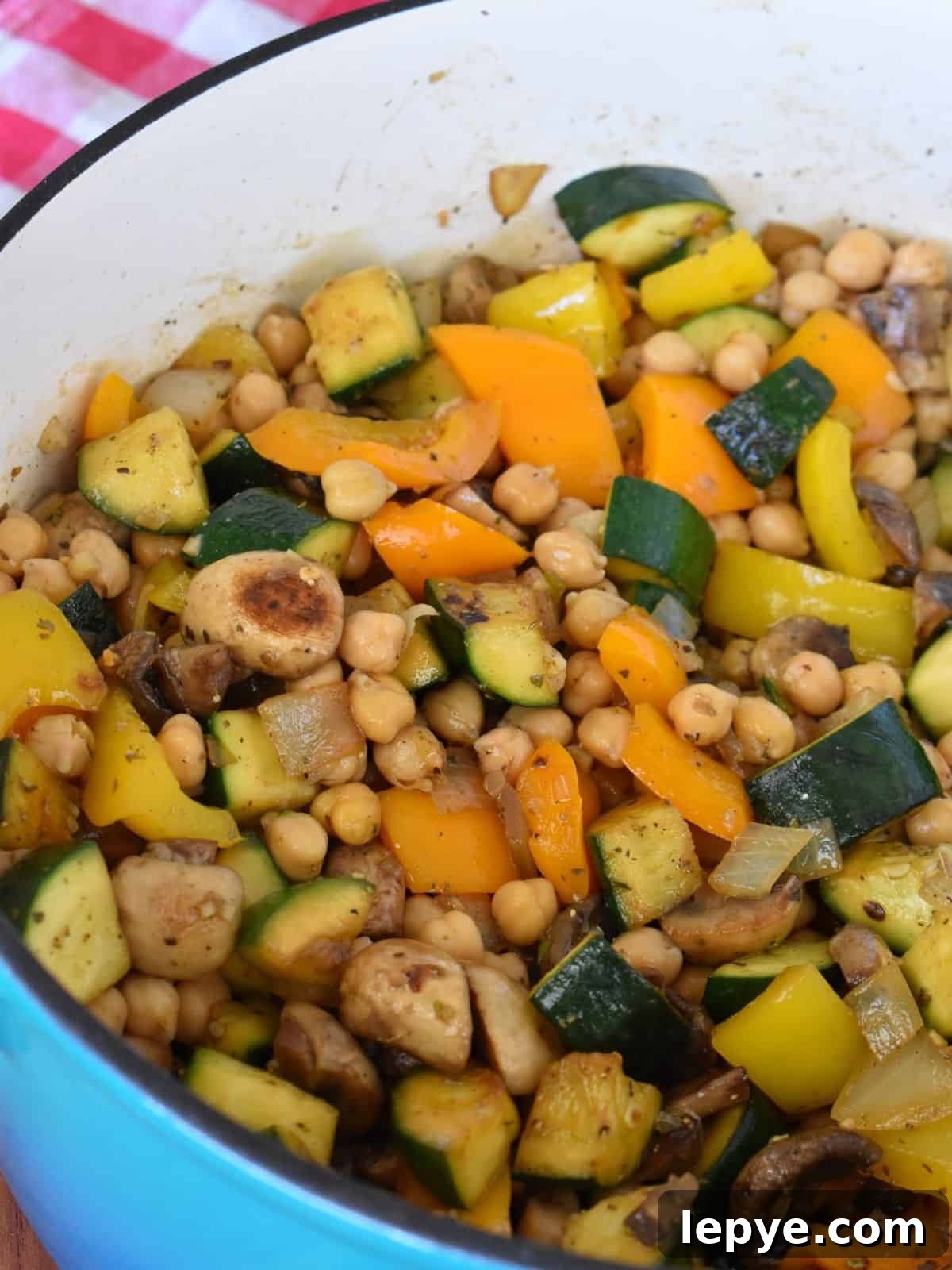 Stovetop Pan-Roasted Vegetables with Garlic White Beans 9 Pan Roasted Vegetables and beans in a large pot.
