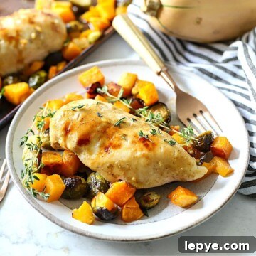 Sheet Pan Chicken with Roasted Butternut Squash 11 chicken with butternut squash on a plate