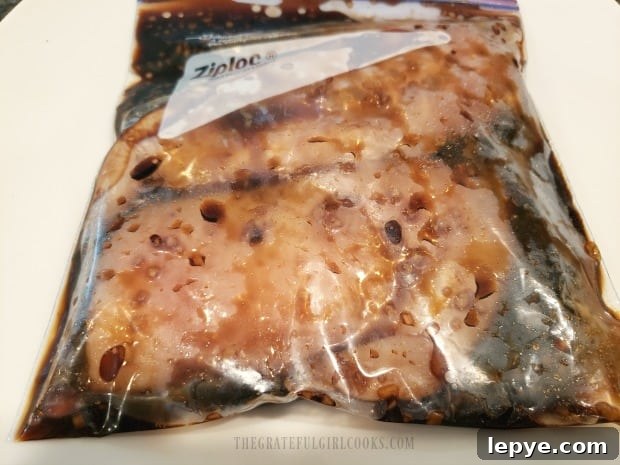 The teriyaki marinade covers the meat to give it flavor.