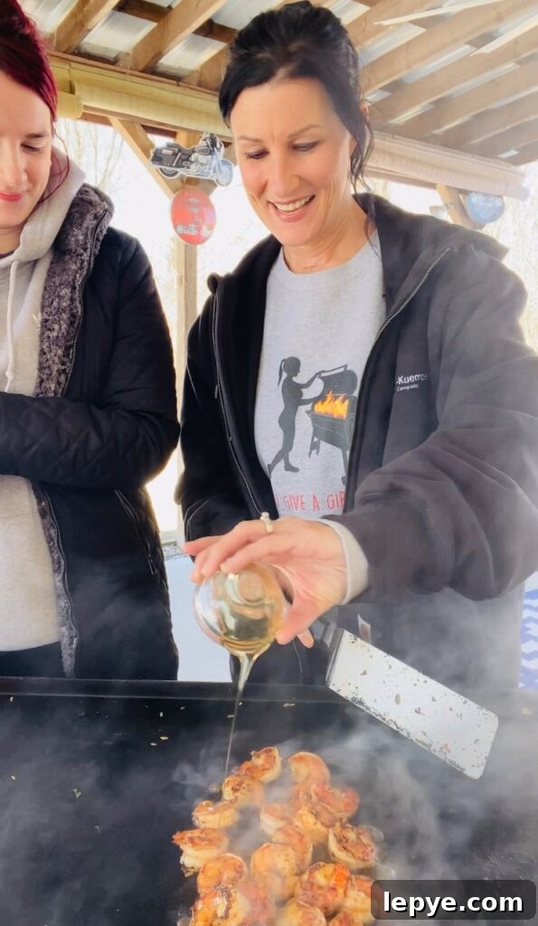 adding hot honey to shrimp