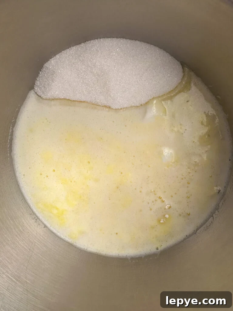 Southern-Style White Texas Sheet Cake Recipe 6 Sugar added to melted butter in a sauce pan.