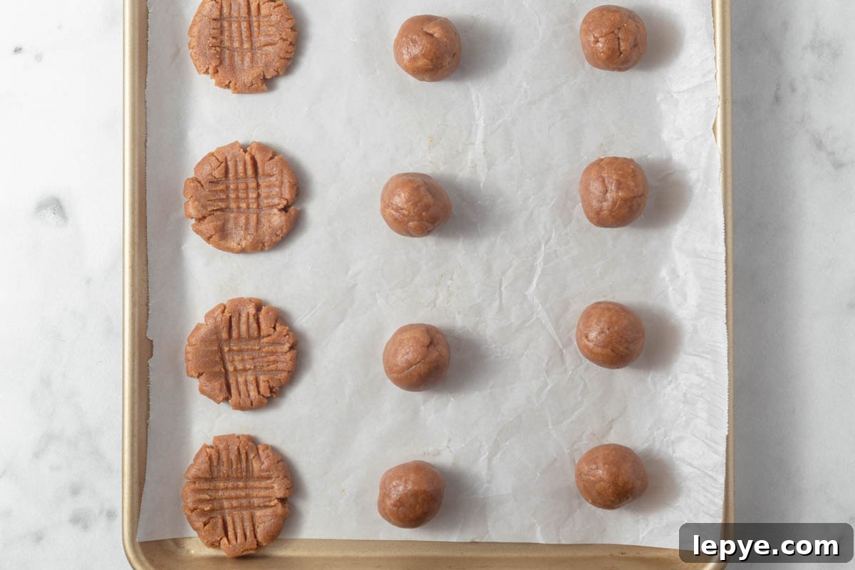 Keto peanut butter cookie dough ball on the baking sheet