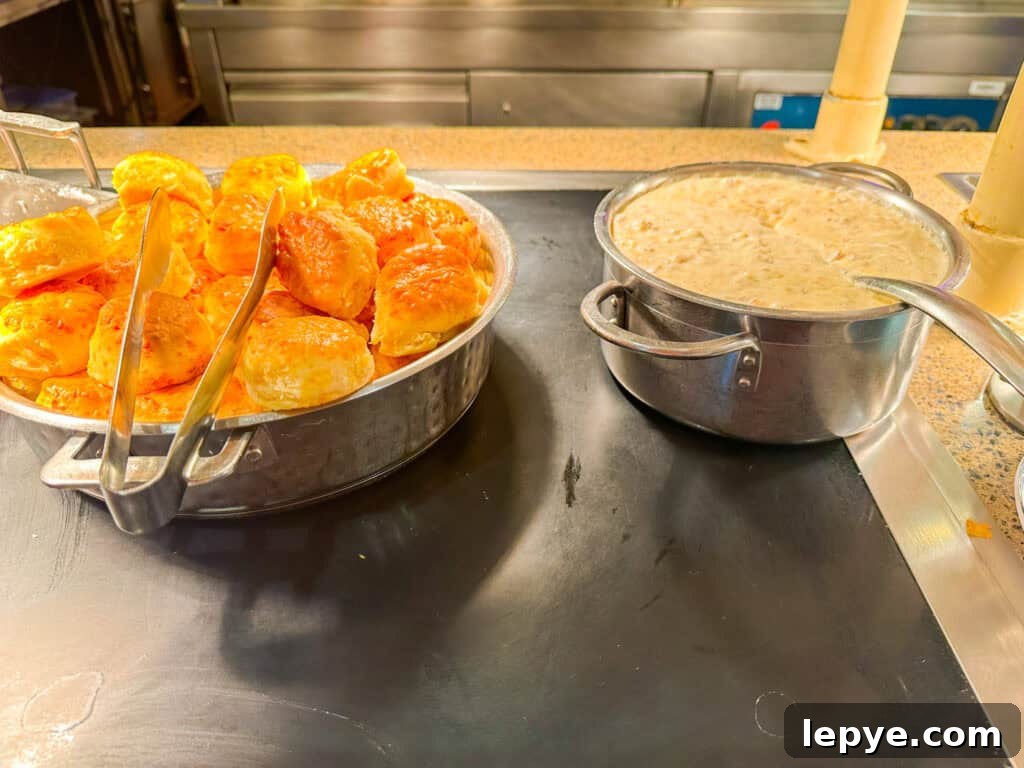 Cape May Café Breakfast Menu & Tips for Dining at Disney's Beach Club 7 biscuits and gravy on the buffet.