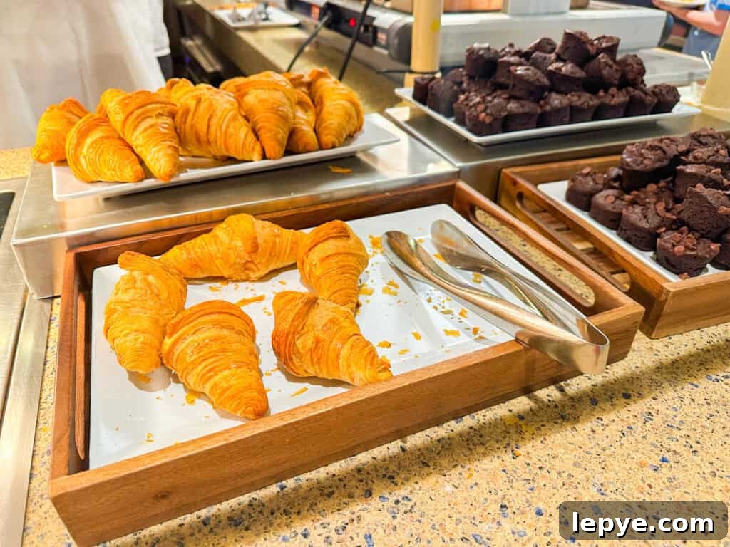 Cape May Café Breakfast Menu & Tips for Dining at Disney's Beach Club 9 pastries on the buffet.