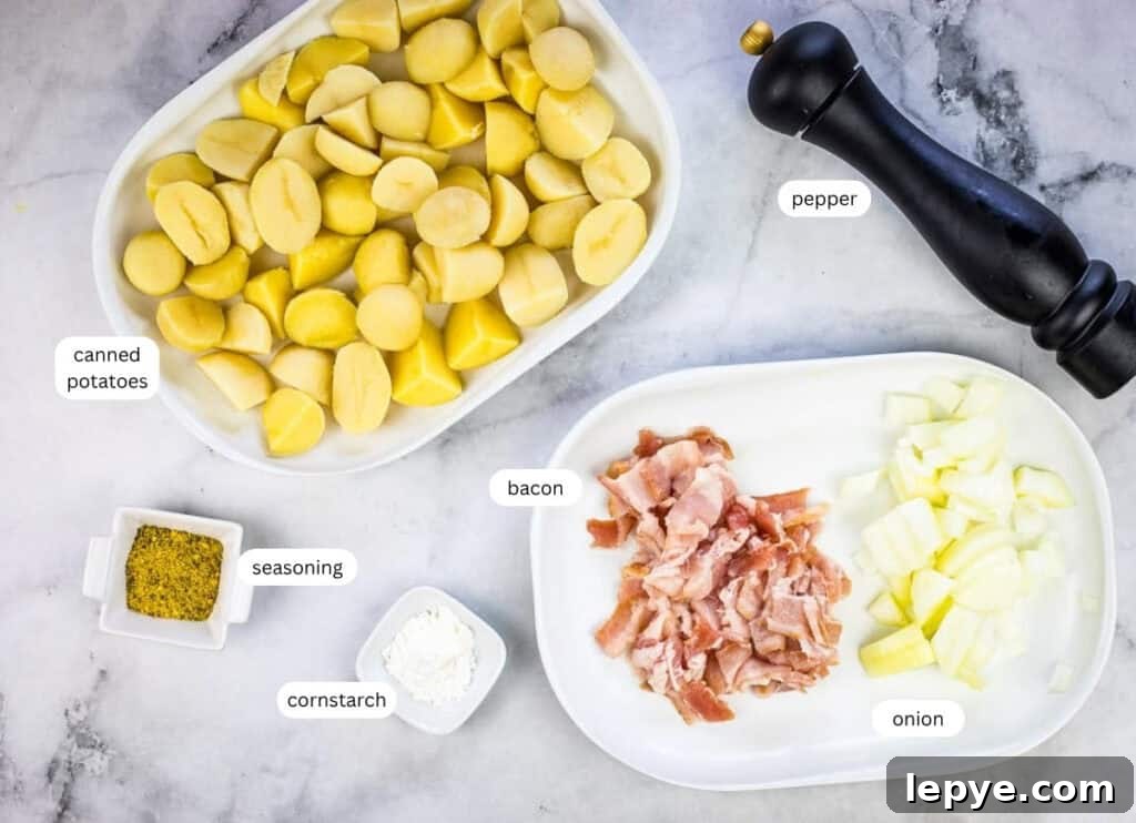 Crispy Blackstone Fried Potatoes: Simple Skillet Recipe 3 Sliced canned potatoes, chopped bacon, diced onion, seasoning, cornstarch, and a pepper grinder arranged on a countertop.