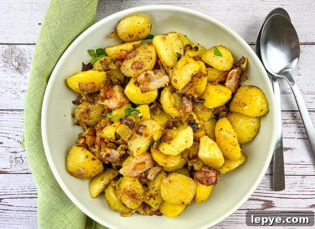 Crispy Blackstone Fried Potatoes: Simple Skillet Recipe 8 blackstone fried potatoes in a serving bowl.