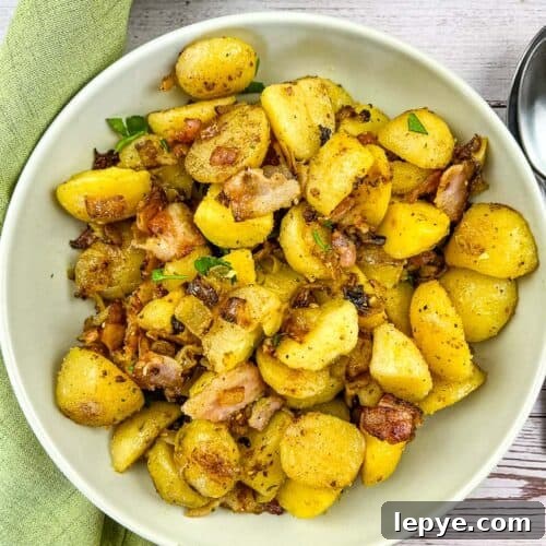 Crispy Blackstone Fried Potatoes: Simple Skillet Recipe 9 Blackstone fried potatoes in a serving bowl.